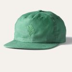 green baseball cap