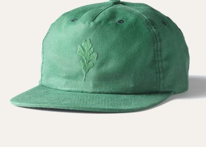 green baseball cap