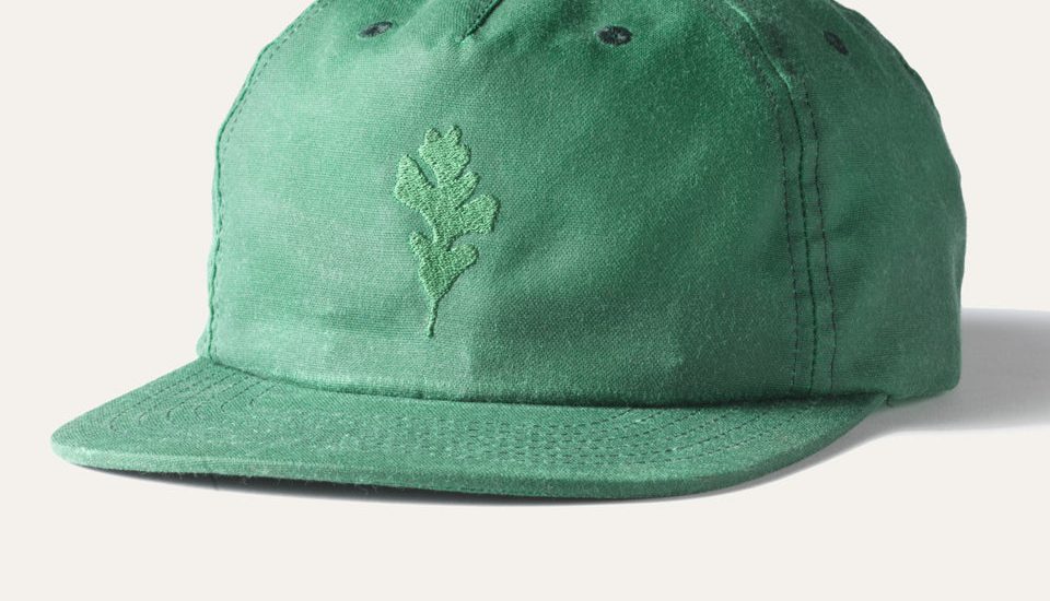 green baseball cap